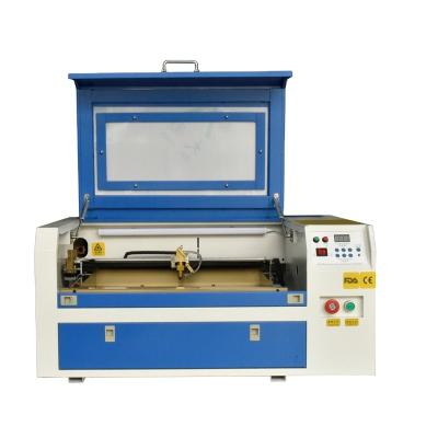 China High Quality Water Cooled CO2 3050 Laser Engraving Cutting Machine MDF Morocco Paper Fabric for sale