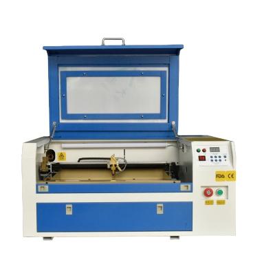 China 3050 CO2 Water Cooled Mini Laser Engraving Cutting Machine For Cheap Laser Engraver For Fabric Wood for sale