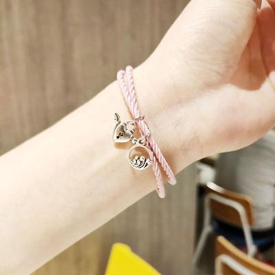 China TRENDY Couples Rope Bracelets Hand Magnet Natural Magnetic Adjustable Bracelets For Women Man Lover Wing Key Lock Charm Pendent Jewelry for sale