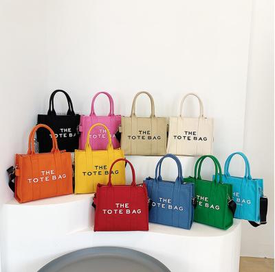 China 2022 New Designer Handbags Famous Brands Women's Main Bag A Fashion Luxury Canvas Tote Bag Purses and Purses for sale