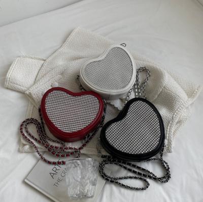 China New High Quality Diamond Clever Cute Messenger Bag Wild Heart-Shaped Chain Cross - Body Bags Grab Handbags for sale