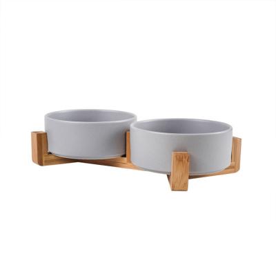 China Sustainable Factory Custom High Tangled Non Slip Dog Bowl Pet Bowl With Wood Rack for sale