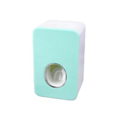 China Viable Accept Hands Free Manual Toothpaste Dispenser Custom Logo New Wall Mounted Plastic Bathroom for sale