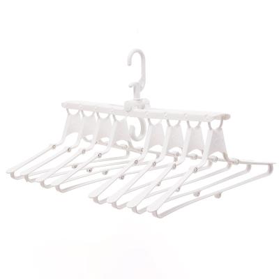 China Sustainable Multifunctional Folding Non-slip Children's Plastic Clothes Hanger Drying Rack Magic Hanger for sale