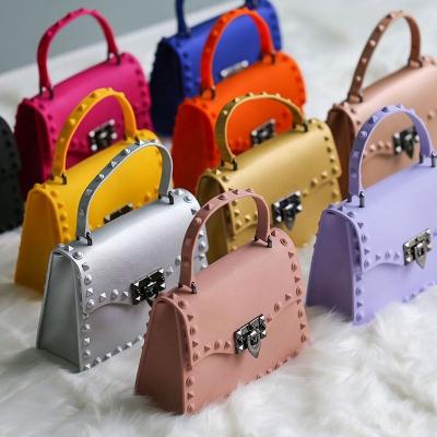 China High Quality Women Shoulder PVC Women Handbag Ladies Handbags 2021 Fashionable Wrap Rivet Bag Custom Shoulder Bag Cross - Body Purses for sale