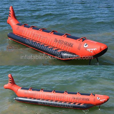 China 0.6mm/0.9mm PVC tarpaulin the red shark sea inflatable banana boat for sale for sale