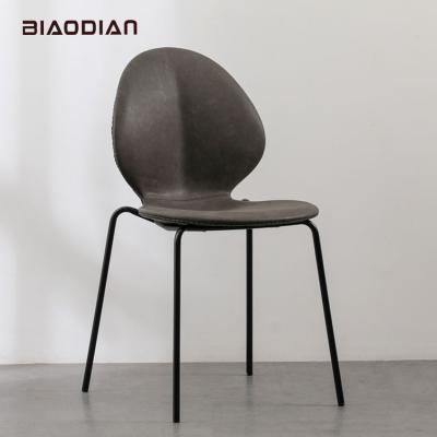 China Modern Simple Nordic Beauty Butterfly Chair Industrial Leather Dining Chairs for sale