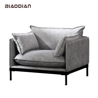 China Modern Nordic italian living room furniture hot sale gray velvet one seat fabric luxury sofas poltrona for sale