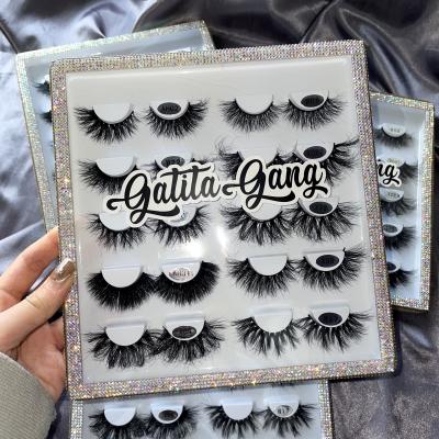 China Wholesale mink lashes3d soft lashes 3d full strip soft fluffy faux mink lashes bling mink eyelash book packaging box for sale