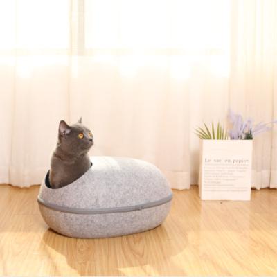 China Pawise Sustainable Wool Felt Cat Cave Egg Shape Bed Pet Felt Pet Bed With Zipper for sale