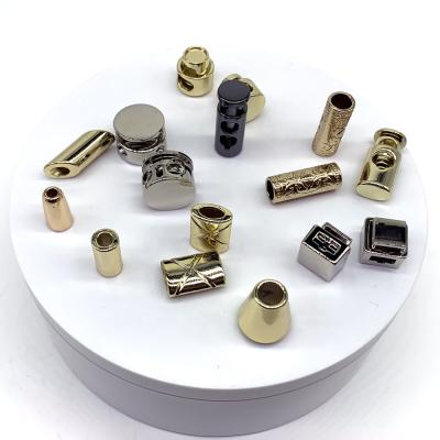 China Factory Wholesale Custom Metal Wind Rope Tie Down Rope Locks Zinc Alloy Nickel Free Ends Cord Spring Stopper For Sweater for sale