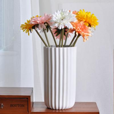 China Bisque With Fluted Effect Plant High End Chinese White Porcelain Fluted Vase For Home Decoration for sale