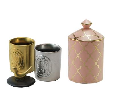 China Europe custom embossed logo debossed ceramic candle jars vessels holders with lids in bulk for sale