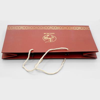 China Wholesale Recyclable Luxury Paper Packaging Bag Printed Custom Logo Packaging Paper Bag Clothing Shopping Gift Jewelry for sale