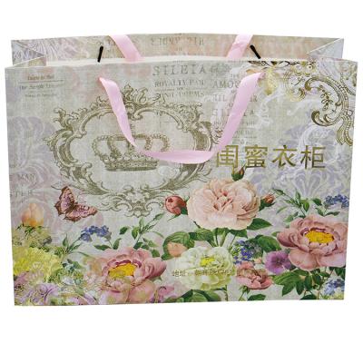 China Shopping Bag Customized Luxury LOGO Recyclable Promotional Paper Reusable Shopping Paper Bag With Ribbon Handle for sale