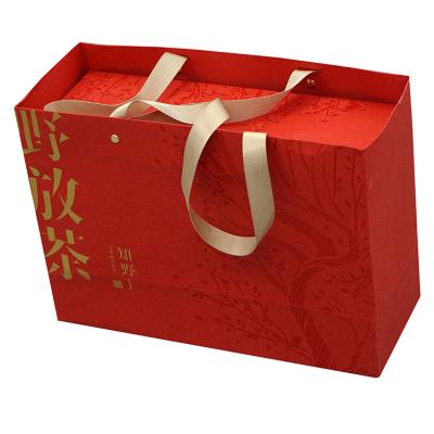 China Retail Recyclable Custom Tea Shop Bag Logo Luxury Paper Packaging Paper Bag With Logo for sale