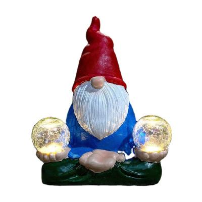 China Home Decoration Made Of China Top Quality Resin Open Solar Lamp Light Garden Gnome Statue for sale