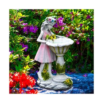 China Custom Solar Garden Lamp Decorative Resin Opens Fairy Tale Garden Statue Home Decoration Angel Flower Fairy Flower Pot Outdoor Ornament for sale