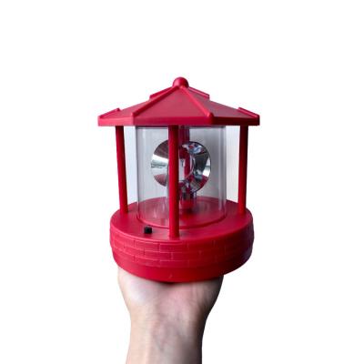 China Solar Garden Resin Miniature Sea Side Tower Lamp Lighthouse With Revolve Light for sale