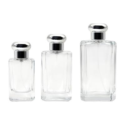 China Cosmetic Manufacturer Luxury Empty Clear Flat Rectangular Shaped 25ml 50ml 100ml Spray Perfume Glass Bottles for sale