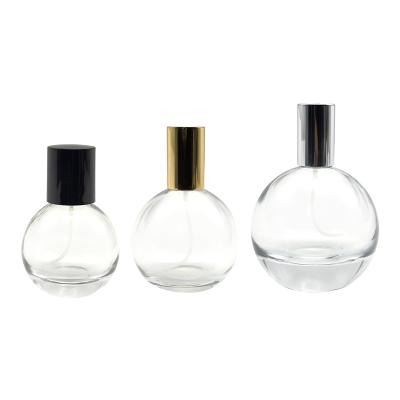 China Cosmetic New Design Custom Product Unique Round Sphere Shaped Luxury Empty Spray Perfume Glass Bottle 30ml 50ml 100ml for sale