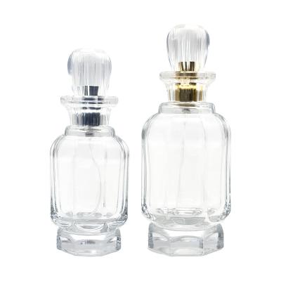 China Cosmetic Luxury Wholesale Custom Made 50ml 100ml Unique Shaped Empty Spray Atomizer Glass Perfume Fragrance Bottle for sale