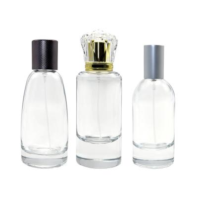 China Cosmetic Luxury Wholesale Luxury Empty Round Cylinder Shaped Spray Perfume Bottle Fragrance Atomizer Glass Bottle 50ml 100ml for sale