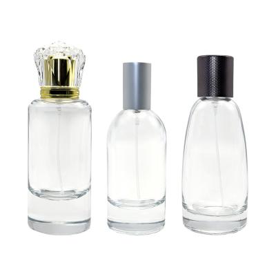 China Cosmetic Custom Made Empty Luxury Manufacturer 50ml 55ml 100ml Round Cylinder Clear Flat Glass Spray Perfume Bottle for sale