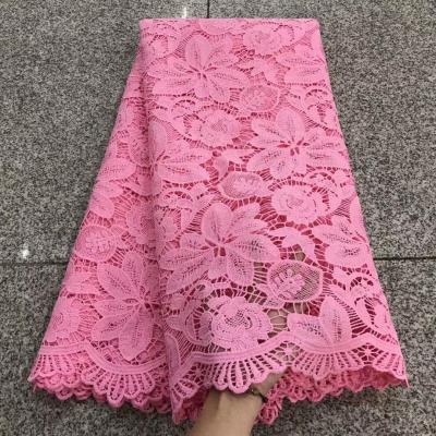 China Water Soluble Milk Peach Silk Hollow African Lace Fabric Viable For Sewing Tailors for sale