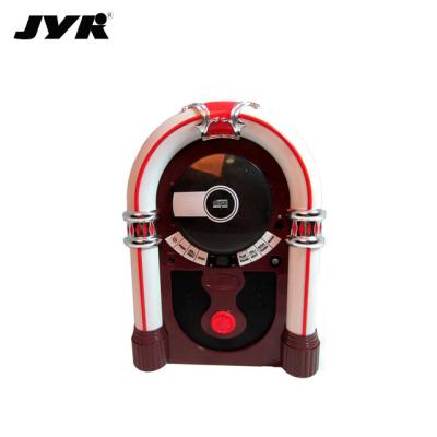 China Hot Sale Handmade High Quality Retro Karaoke Speaker System Wooden Jukebox with CD Player, BT, Aux. in, radio and stereo speakers for sale