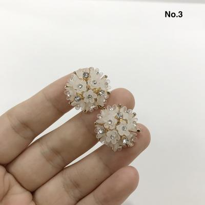 China Viable Shiny Flower Shape Plastic Alloy Rhinestone Buttons For Wedding Card for sale