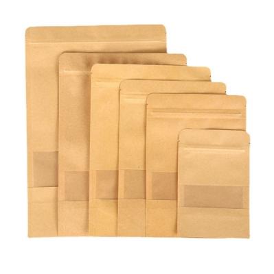 China Handmade Brown Kraft Paper Food Bag Stand Up Pouches For Small Food Packaging Bags With Zipper for sale