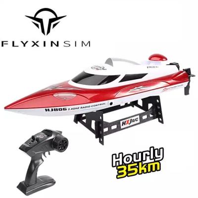 China Waterproof 2.4G Motor Flyxinsim HJ809 RC Fishing Boat Jet LED Light Fishing Boat Trawler Speedboat rc boat for sale