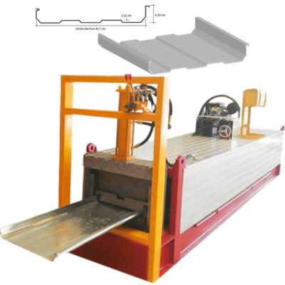 China 20-26 Gauge KR18 KR24 Standing Seam Portable Roll Forming Machine for sale