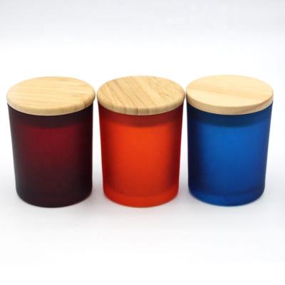 China ECO-frendly wholesale frosted matte colored glass jar for candles with wooden lid for sale