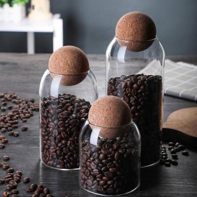 China Sustainable Storage Bottles And Jars Food Storage Container With Cork Lid High Borosilicate Clear Glass Jar for sale