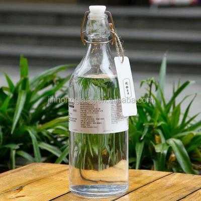 China Sustainable Glass Water Bottle With Flange Lid for sale