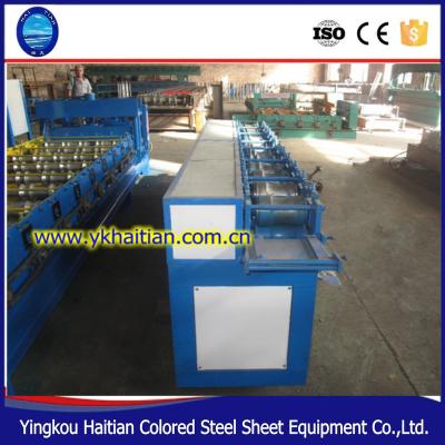 China automatic galvanized steel plate 75 roller shutter door frame cold roll forming machine for sale