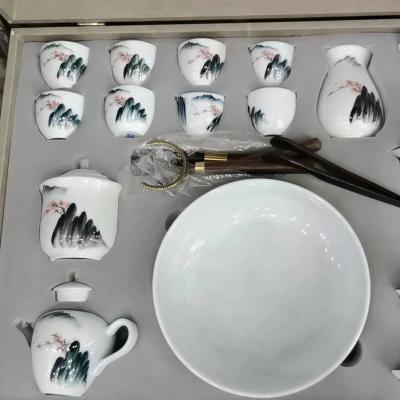 China Sustainable Luxury landscape painting ceramic tea set fully carved handmade ceramic teapot bestselling classic tea set for sale