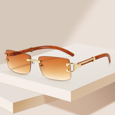 China 2021 GLASSES Exquisite Fashion Rectangle Sun Glasses Unisex Rimless Sunglasses Small for sale