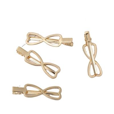 China Hair accessories Korean fashion 7CM metal bow tie duckbill clip DIY girl golden alligator clip accessories wholesale for sale