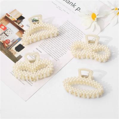 China Korean version of fashion pearl white plastic hair hair accessories caught oval shark Chuck Hairpin Wholesale lady temperament big heart for sale