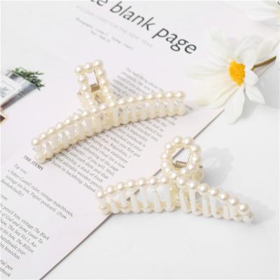 China Hair accessories factory direct white plastic pearl hair caught big lady crossword shark hairpin wholesale for sale