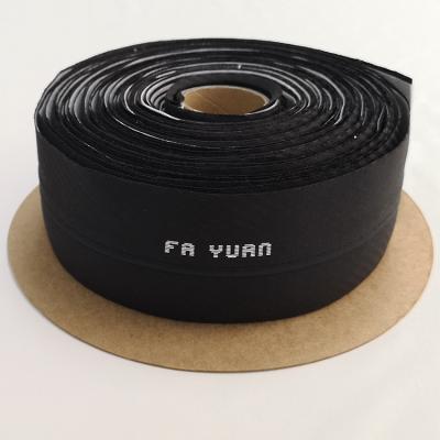 China Other Custom Logo Herringbone Fabric Belt Lining For Suits Pants for sale