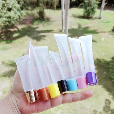 China Wholesales 10ml 15ml 20ml Fashionable Empty Lip Gloss Rose Gold Top Private Label Lid Lip Gloss Squeeze Tube Silver Packaging for sale