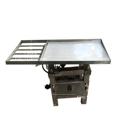 China Snack Factory Chocolate Vibrating Table Machine, Chocolate Vibrating Table Machine, Chocolate Process Machine for sale