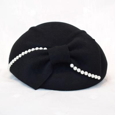 China Special wrinkle pattern and new fashionable big bow bead decoration women's Madame Wool Felt Beret hat for sale