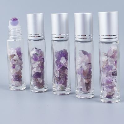 China Europe Crystal Jade Natural Stone Roller Chip Bottle Essential Oil Crushed Stone Amethyst Roll Ball Massage Bottle for sale