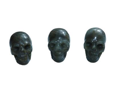 China Art Nature Folk Black Snap Stone Skeleton Head Shaped Sculpture Carving Semi-precious Stone Crafts For Decoration Home Ornaments for sale