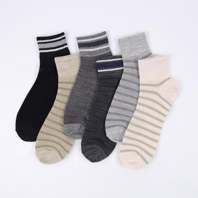 China News Solid Color Sports Socks Breathable Soft Bamboo Socks Plain Striped Socks for sale